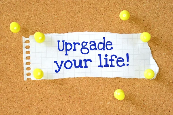 La frase Actualizar su vida escrita en un pedazo de papel —  Fotos de Stock