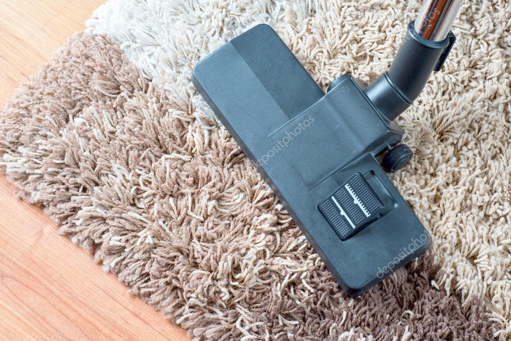Vacuuming very dirty white carpet — Stock Photo © roobcio 54024697