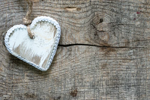 Coeur sur un fond en bois — Photo