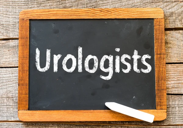 Blackboard with word Urologists — Stock Photo, Image