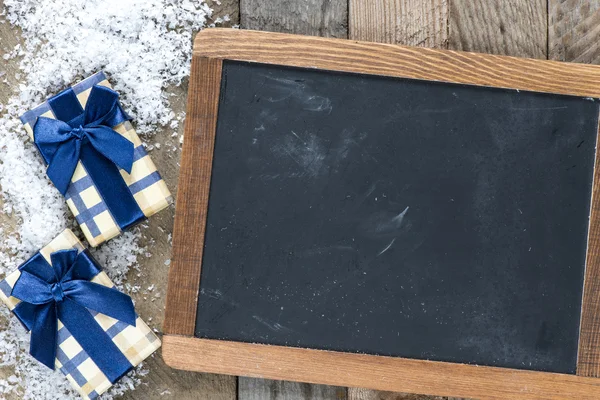 Blackboard and Christmas decorations — Stock Photo, Image