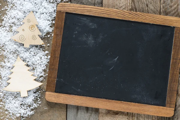 Blackboard and Christmas decorations — Stock Photo, Image