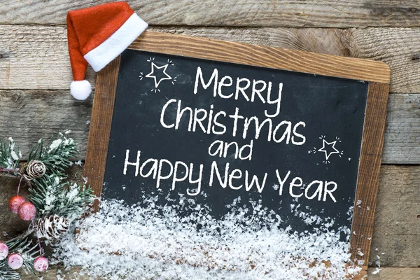 Christmas inscription on blackboard — Stock Photo, Image