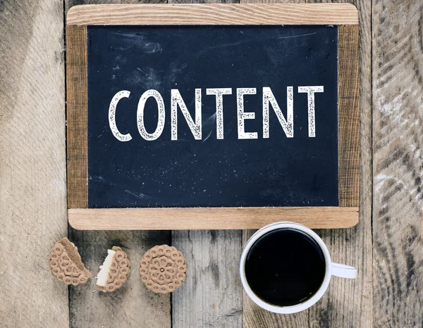 Content sign on blackboard — Stock Photo, Image