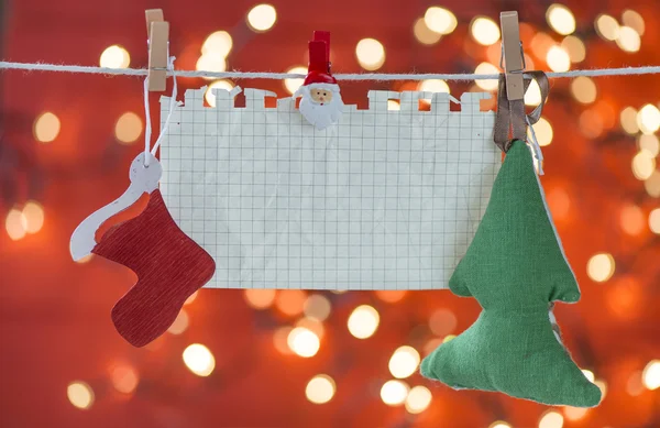 Decoración navideña y hoja de papel —  Fotos de Stock