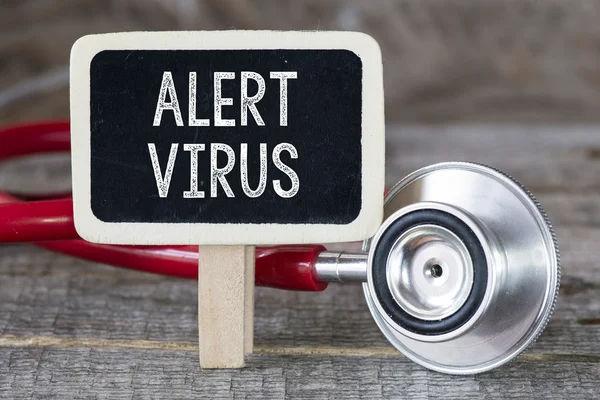 Alert  virus and stethoscope — Stock Photo, Image