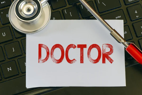 Doctor sign and stethoscope. — Stock Photo, Image