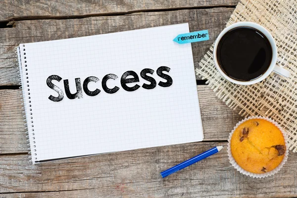 Notebook with success sign — Stock Photo, Image