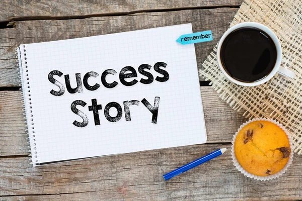 Notebook with  success story sign — Stock Photo, Image
