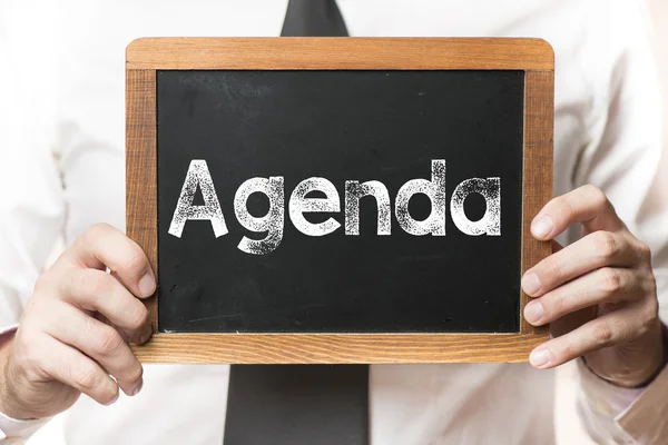 Empresario con palabra de agenda — Foto de Stock