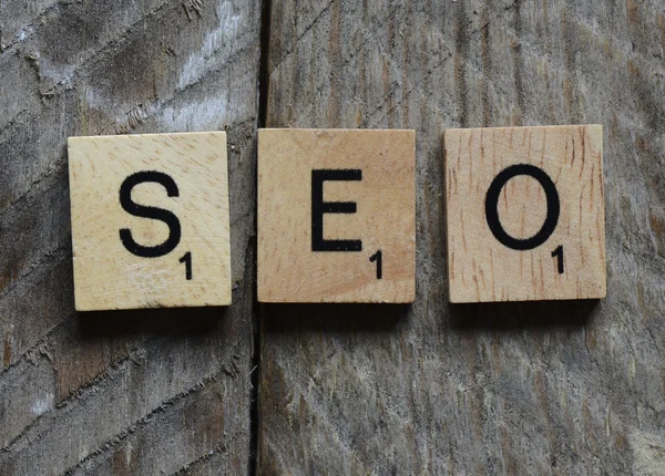 Scrabble letters spelling SEO — Stock Photo, Image