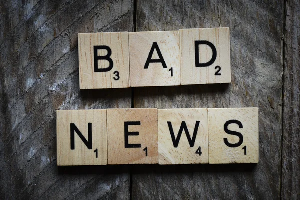 Letters spelling bad news — Stock Photo, Image