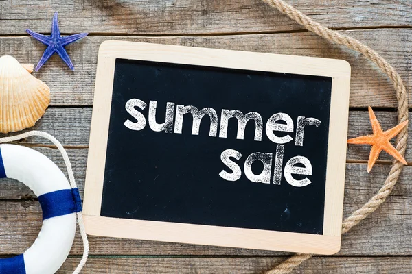 Summer sale Text on blackboard