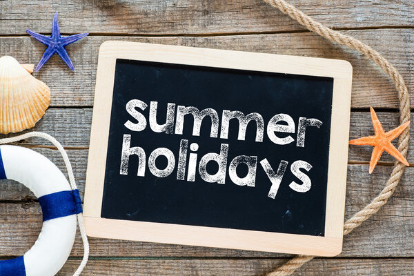 Summer holiday Text on blackboard