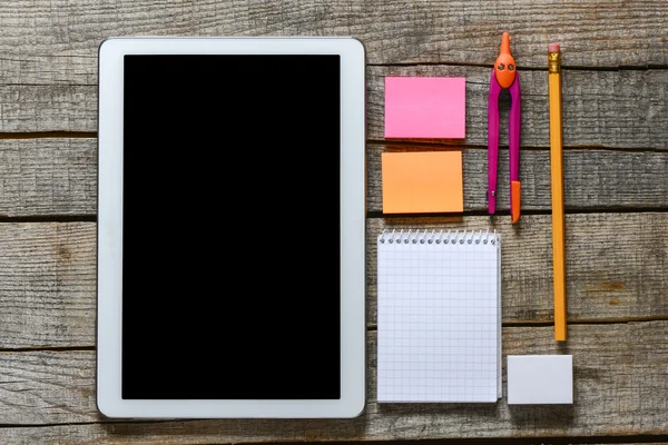 Tablet pc and school supplies — Stock Photo, Image