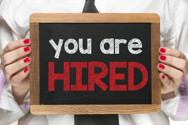 Blackboard with you are hired — Stock Photo, Image