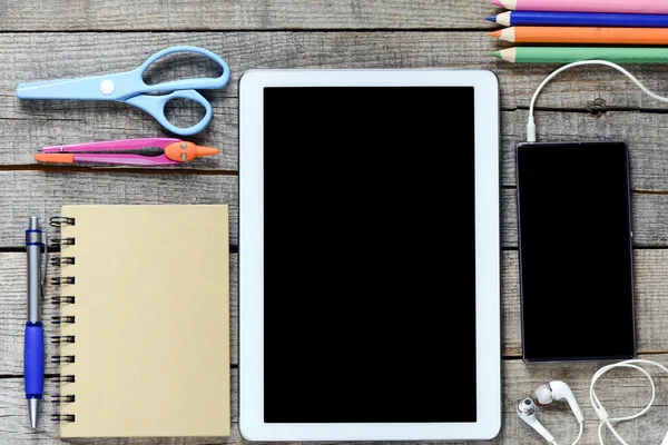 Tablet pc and school supplies — Stock Photo, Image