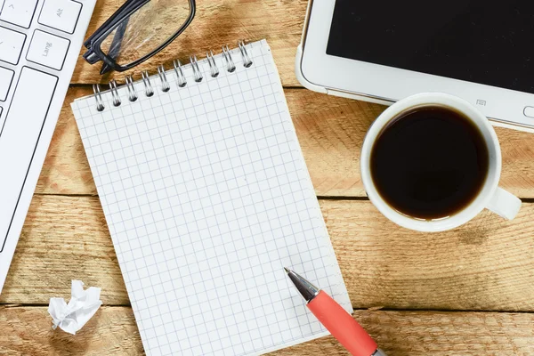 Workplace with notebook and coffee — Stock Photo, Image