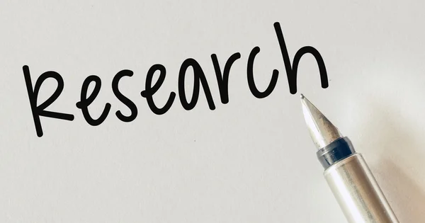 Slovo výzkum a plnicí pero — Stock fotografie