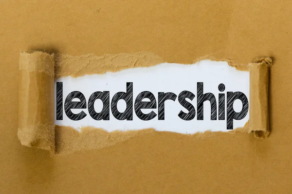 Torn paper with leadership word — Stock Photo, Image