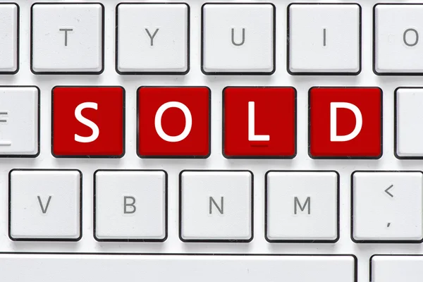 Клавіатура з продаваною кнопкою — стокове фото