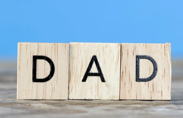 Scrabble letter spelling Dad — Stock Photo, Image