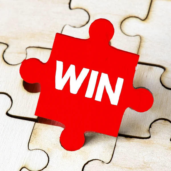 Win sign on puzzle — Stock Photo, Image