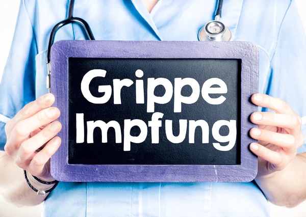 Yazı tahtası üzerinde grip impfung — Stok fotoğraf