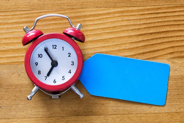 Alarm clock  with blank sign — Stock Photo, Image