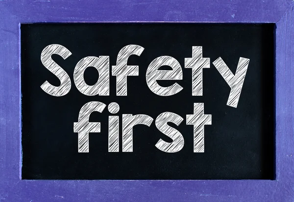 Safety first on blackboard — Stock Photo, Image