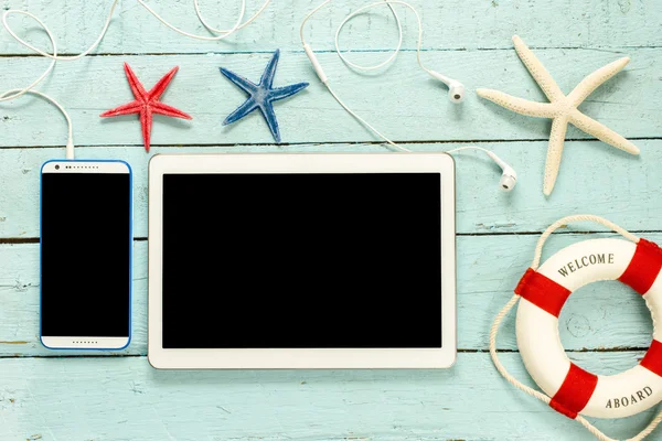 Tablet pc with smartphone and starfish — Stock Photo, Image