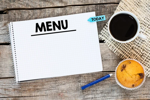 Notebook with menu word   and muffin — Stock Photo, Image