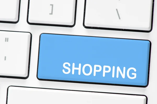 Computer white keyboard with shopping — Stock Photo, Image