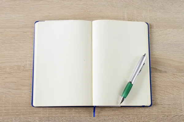 Blank notepad with pen — Stock Photo, Image