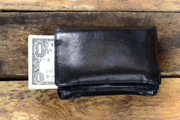 Бумажник с банкнотой в один доллар — стоковое фото