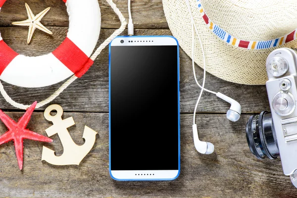 Téléphone intelligent avec étoile de mer — Photo