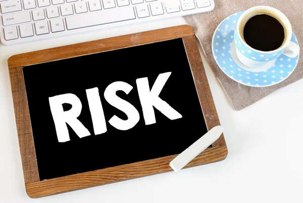 Risk On Blackboard with chalk — Stock Photo, Image