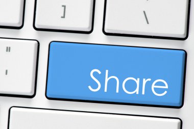 Computer white keyboard with  share.