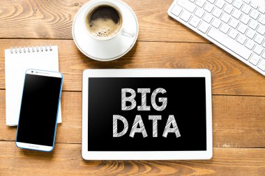Tablet pc with big data and coffee