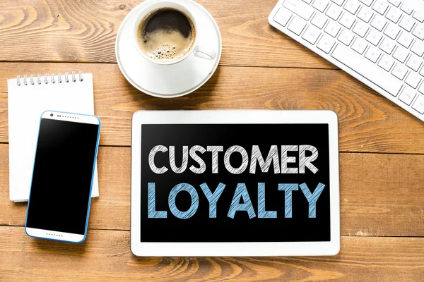 Tablet pc with customer loyalty — Stok fotoğraf