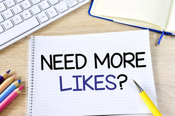 Notepad with need more likes? — Stock Photo, Image