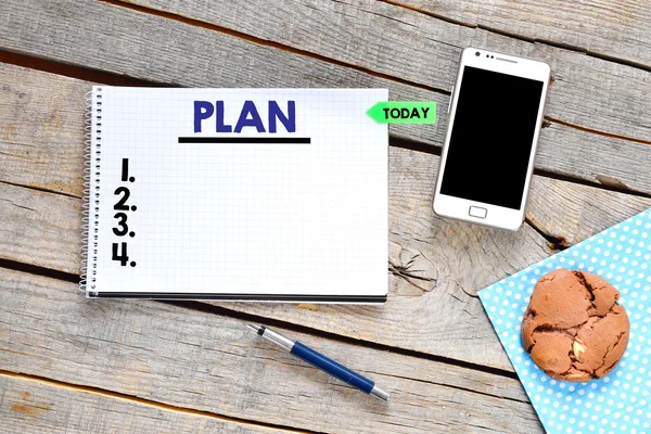 Plan   on paper sheet with  mobile phone — Stock Photo, Image