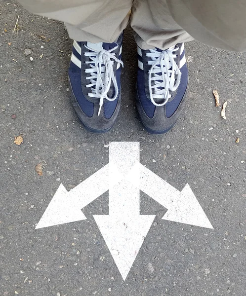 Male sneakers with drawn direction arrows — Stock Photo, Image