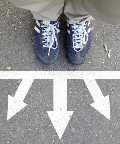 Male sneakers with drawn direction arrows — Stock Photo, Image