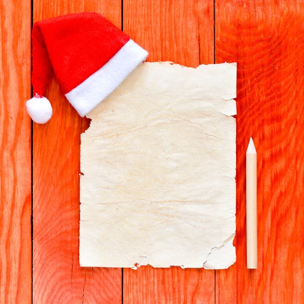 Feliz carta de Navidad con sombrero de santa —  Fotos de Stock