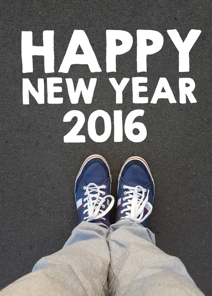 Männer Turnschuhe und ein frohes neues Jahr 2016 — Stockfoto