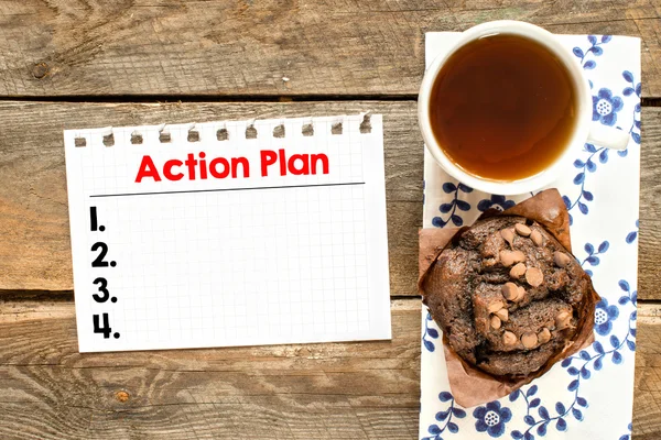 Feuille de papier avec plan d'action — Photo