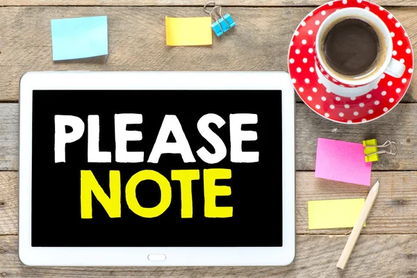 Please note  on tablet pc — Stock Photo, Image