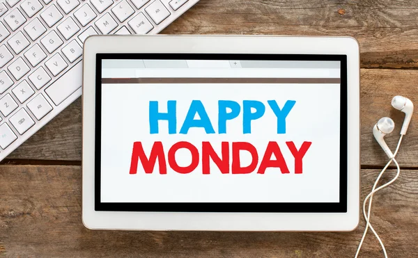 Tablet pc with happy monday — Stock Photo, Image