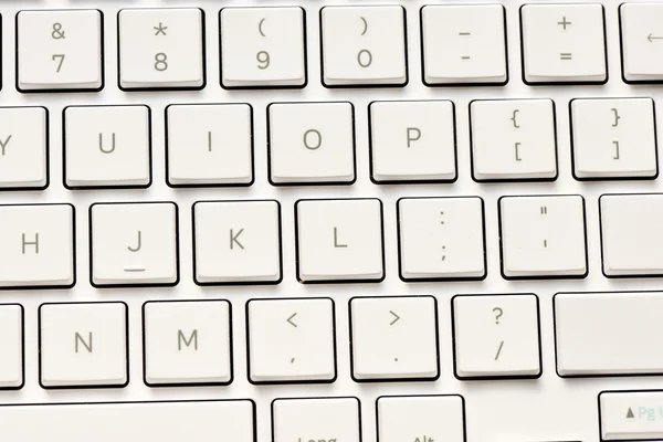 Bílá klávesnice pozadí — Stock fotografie
